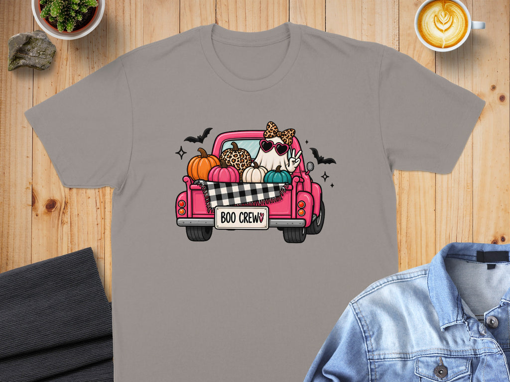 Ghost in heart sunglasses in pink truck with pumpkins and "Boo Crew" text.