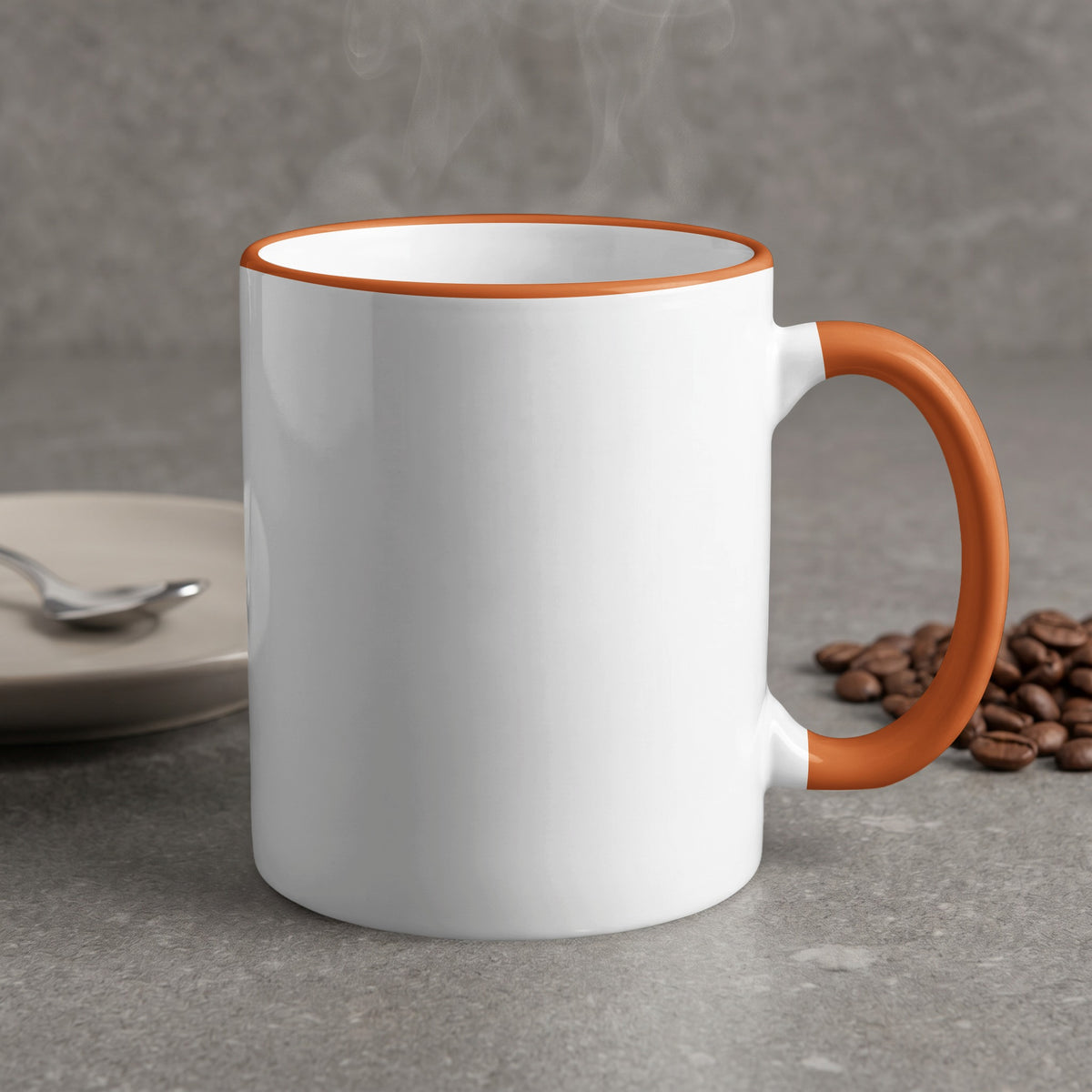 White mug with orange handle and rim, steaming, with coffee beans and saucer.