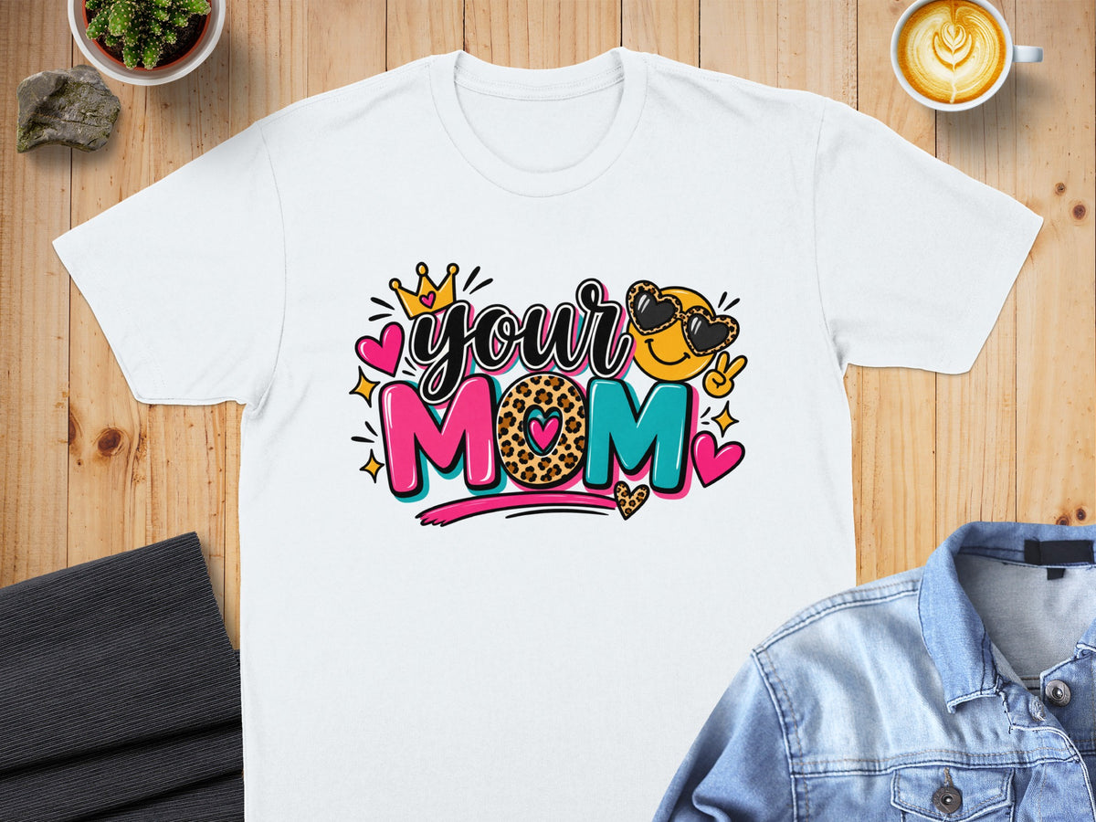 White t-shirt with "your MOM" text and emoji graphics.