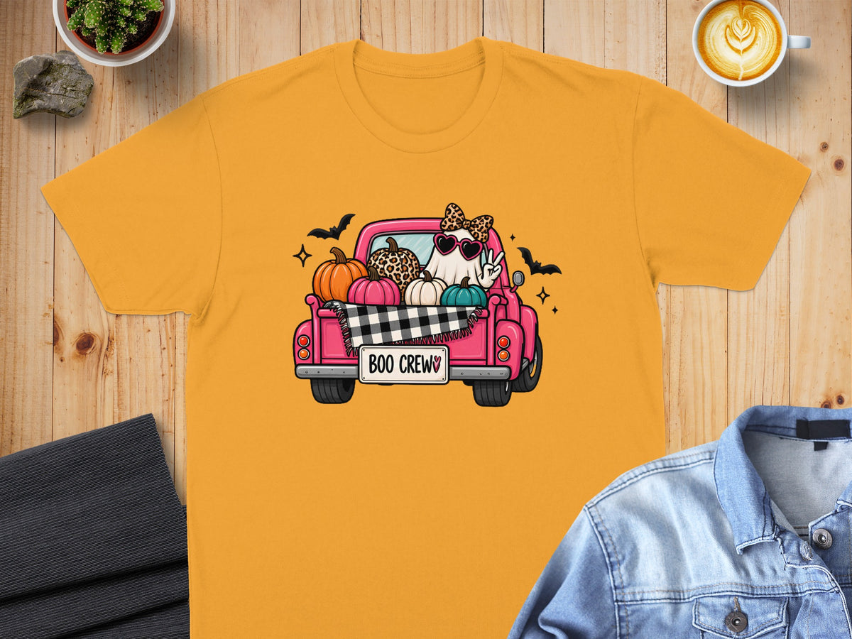 Halloween graphic of a pink truck filled with pumpkins and a ghost wearing sunglasses and a bow.