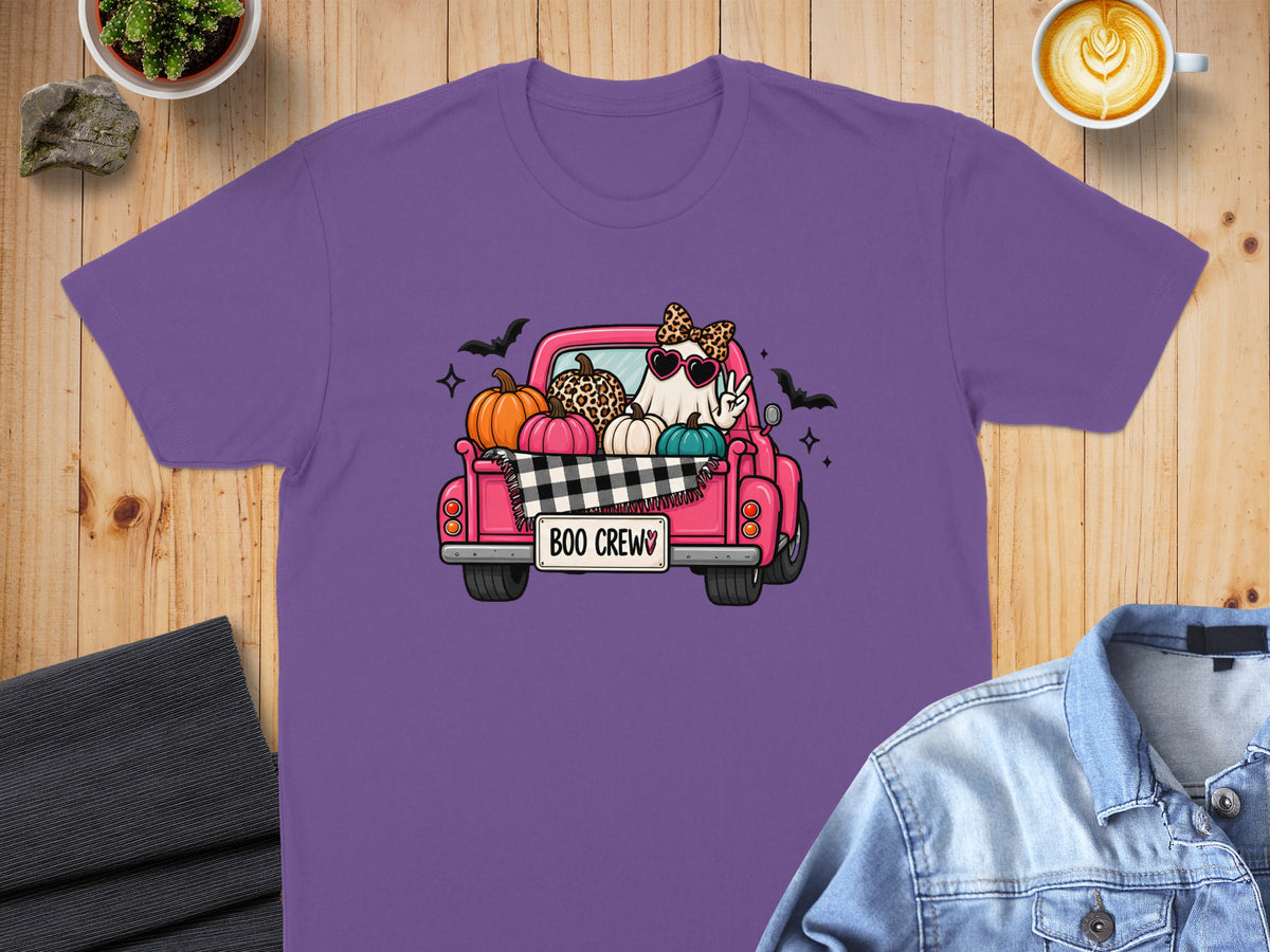 Purple t-shirt with a pink truck filled with pumpkins and a ghost wearing leopard print.